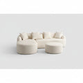 White sofa in a living room with wooden floor and window