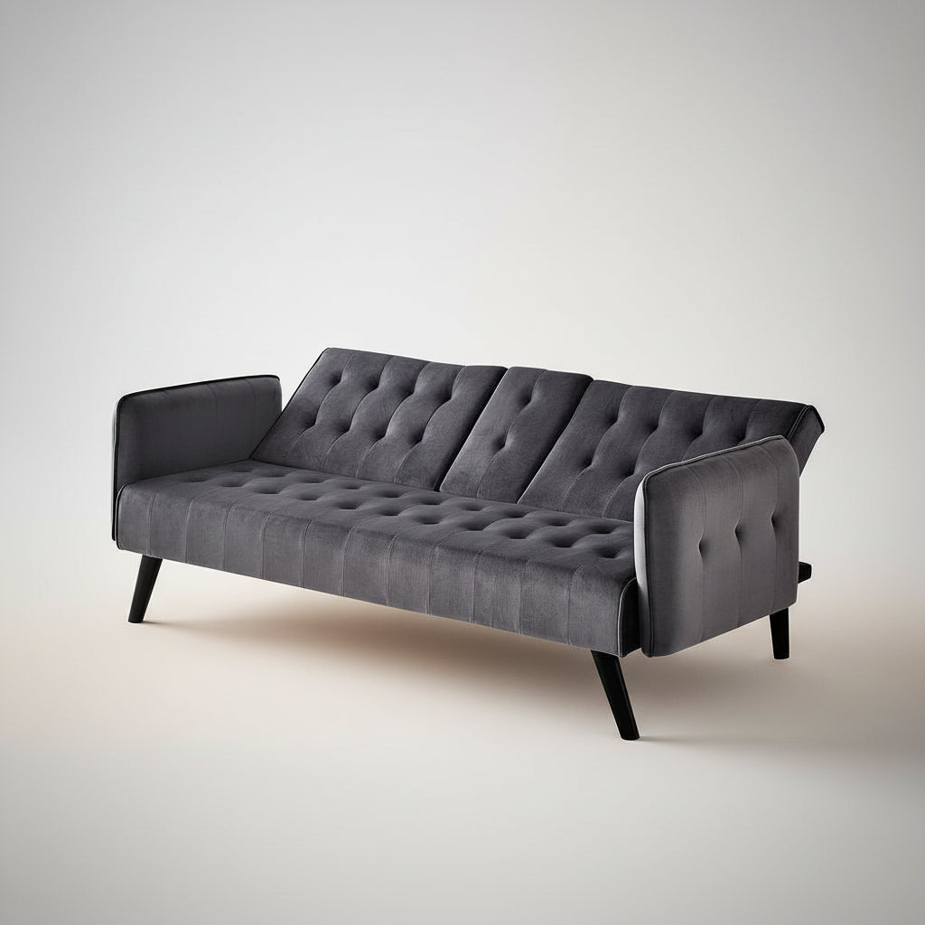Gray tufted sofa bed on a white background